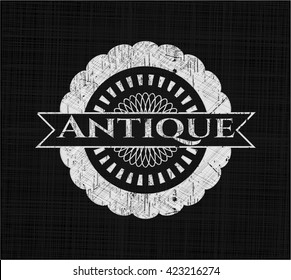 Antique chalkboard emblem written on a blackboard
