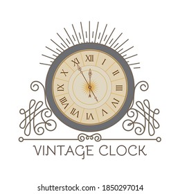 Antique clock with elegant frame. Old fashioned design element. Vintage watch.