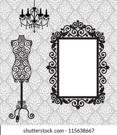 Antique frame, mannequin and chandelier