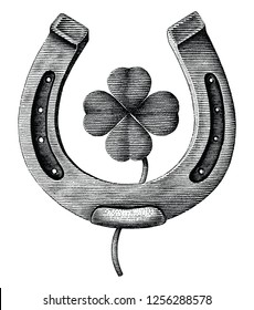 Antique of Horseshoe and clover leaf hand draw illustration vintage engraving style isolated on white background