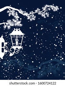 antique lantern and pine tree branches under evening snow fall - winter season holiday mood copy space background