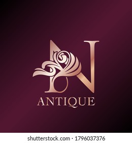 Antique Letter N Initial  Logo Elegance Gold Rose Luxury Ornate Deco Swirl Shape Template Design.