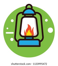 An antique style lantern burning with the fuel used in camping and travelling 