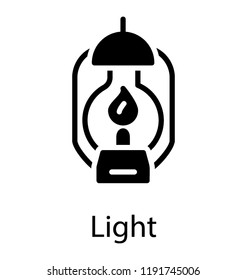 An antique style lantern burning with the fuel used in camping and travelling