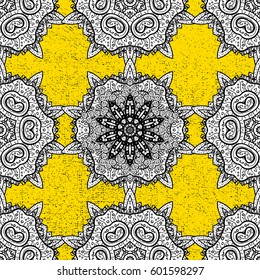 Antique white repeatable wallpaper. Ornamental yellow floral ornament in baroque style. White element on yellow background. Damask pattern repeating background.