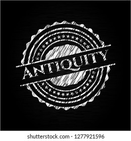 Antiquity chalkboard emblem on black board