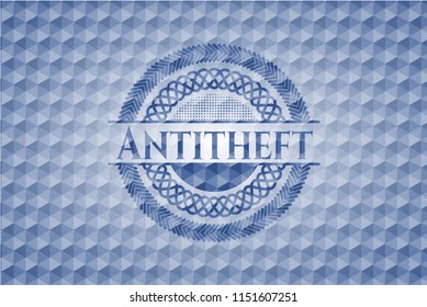 Antitheft blue emblem or badge with geometric pattern background.