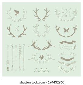 Antlers, arrows, ribbons. Decor elements. Isolated.Vector