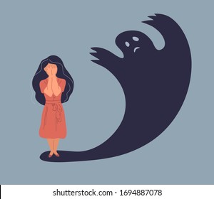 Anxiety or panic attack. Sad young woman with lowered head frightened with his own shadow and having panic disorder. Psychology, solitude, fear or mental health problems concept. Depressed sad person