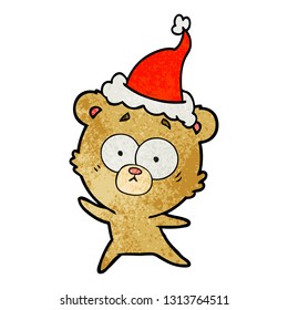 anxious bear hand drawn textured cartoon of a wearing santa hat