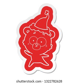 anxious bear quirky cartoon  sticker of a wearing santa hat