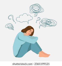  Anxious girl suffering from depression sitting with head in lap. Woman mental health concept. Young unhappy girl with bewildered thoughts in her mind sitting and hugging her knees. Depressed teenager