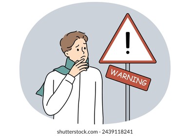 Anxious man standing near warning sign. Worried unhappy guy look at road sign notify alert. Vector illustration.