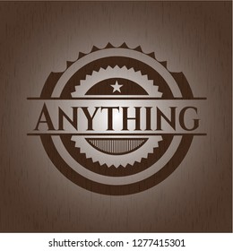Anything badge with wooden background