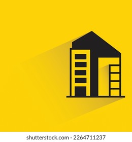 apartment building with shadow on yellow background