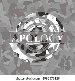 Apology written on a grey camouflage texture 