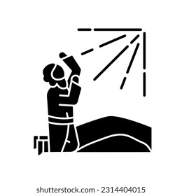 Apostle pray to holy radiance black glyph icon. Saint Paul conversion. Man on knee raise hands to sky. Bible narrative. Silhouette symbol on white space. Solid pictogram. Vector isolated illustration