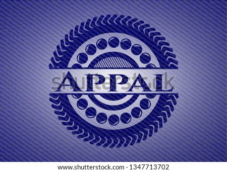 Appal badge with denim background