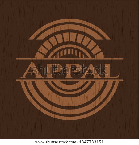 Appal badge with wooden background