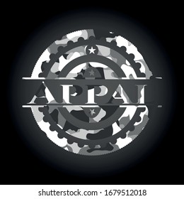 Appal on grey camouflaged texture