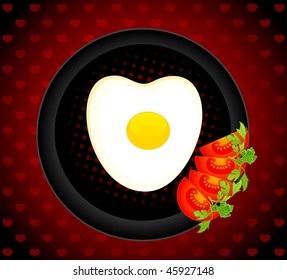 the appetizing delicious fried eggs on a dish are decorated a tomato
