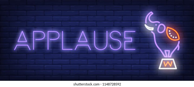 Applause neon style banner. Text and circus elephant on brick background. Night bright advertisement. Can be used for signs, posters, billboards