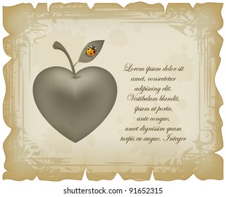 Apple in form of heart on old vintage sheet with stains and blots
