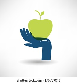 Apple in hand icon