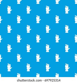 Apple in hand pattern repeat seamless in blue color for any design. Vector geometric illustration