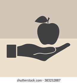 Apple Icon in hand - vector icon