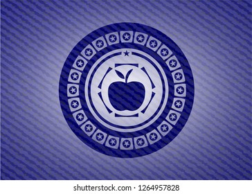 apple icon inside badge with denim background