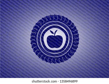 apple icon inside badge with denim texture