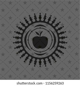 apple icon inside black emblem