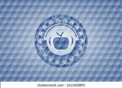 apple icon inside blue emblem with geometric pattern.