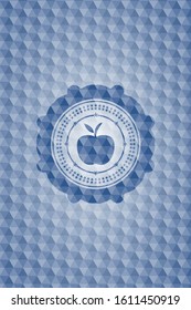 apple icon inside blue emblem with geometric pattern.