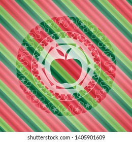 apple icon inside christmas colors badge.