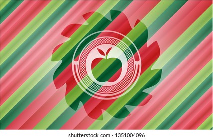 apple icon inside christmas emblem.