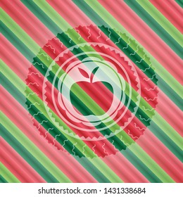apple icon inside christmas emblem background.