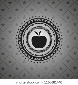 apple icon inside dark badge or emblem