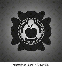 apple icon inside dark badge or emblem