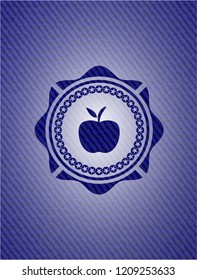 apple icon inside emblem with denim high quality background