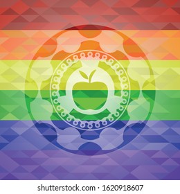 apple icon inside emblem on mosaic background with the colors of the LGBT flag