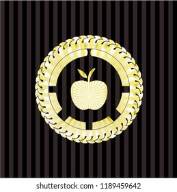 apple icon inside golden badge or emblem