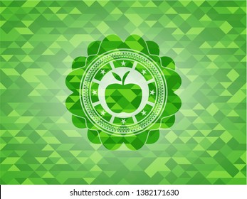 apple icon inside green emblem with mosaic background