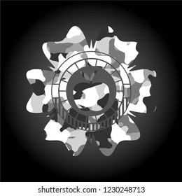 apple icon inside grey camo emblem