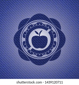 apple icon inside jean or denim emblem or badge background