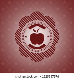 apple icon inside realistic red emblem