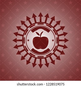 apple icon inside red emblem