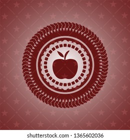 apple icon inside red emblem
