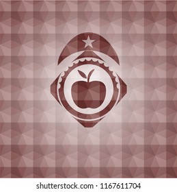 apple icon inside red seamless emblem or badge with geometric pattern background.